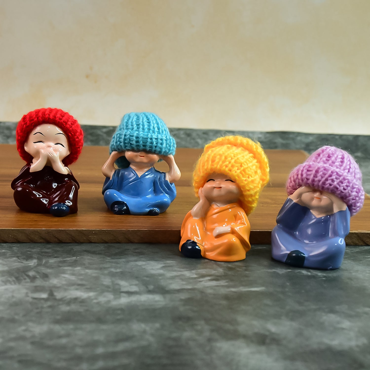 Decorative Resin Monk Buddha Showpiece Set Of 4 With Traditional Straw Hats Decorative Resin Monk Buddha Showpiece Set Of 4 With Traditional Straw Hats